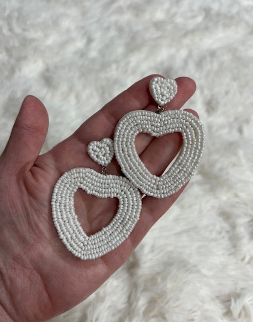 White beaded heart earrings